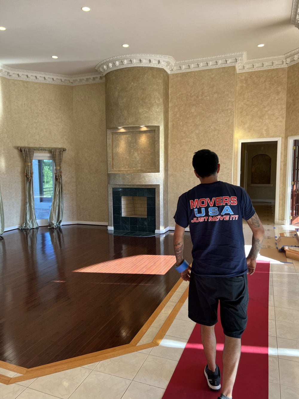 Movers USA crew working inside customer home